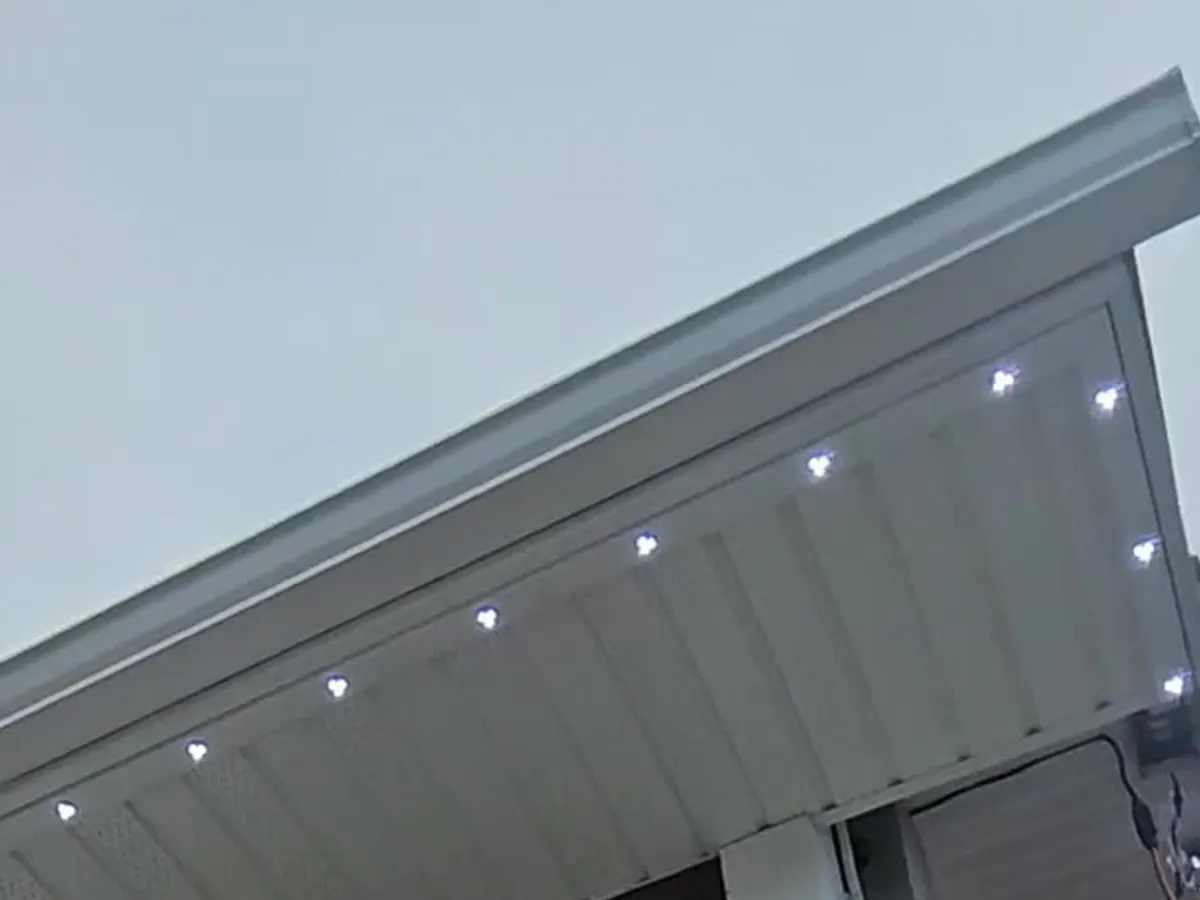 Track turning a soffit corner in one clean, continuous line